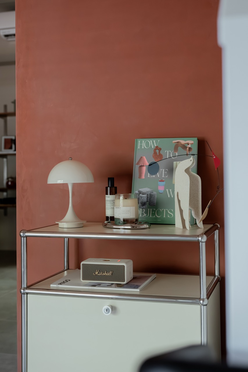 Selected lighting, books and speaker in the BAYIT lobby